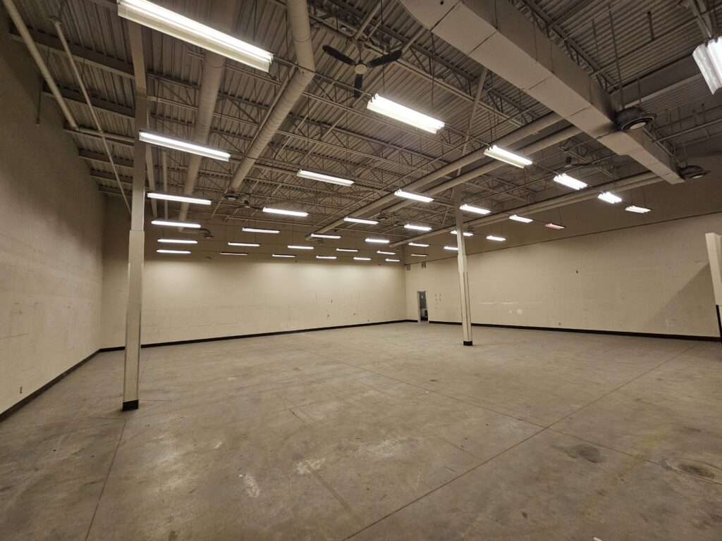 Before image of industrial room with tube lighting